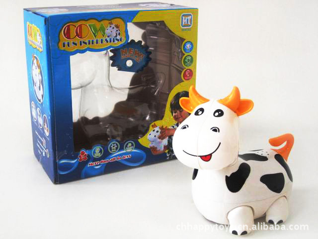 厂家直销电动万向卡通奶牛 灯乐 音乐 电动玩具