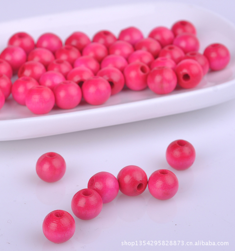 厂家直销不退色挂件配件,木头,木珠批发来样定