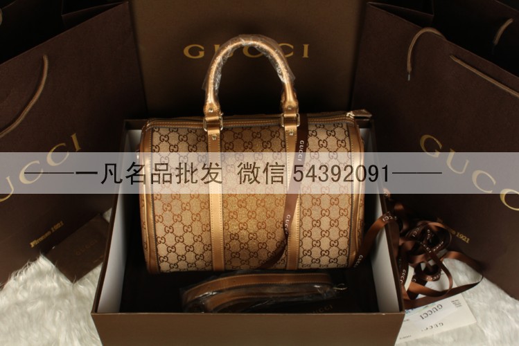 <em>酷奇女包</em> 波士顿圆筒包金丝布枕头包 手提包斜