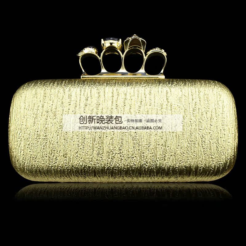 金色四指骷髏頭手抓包樹皮紋