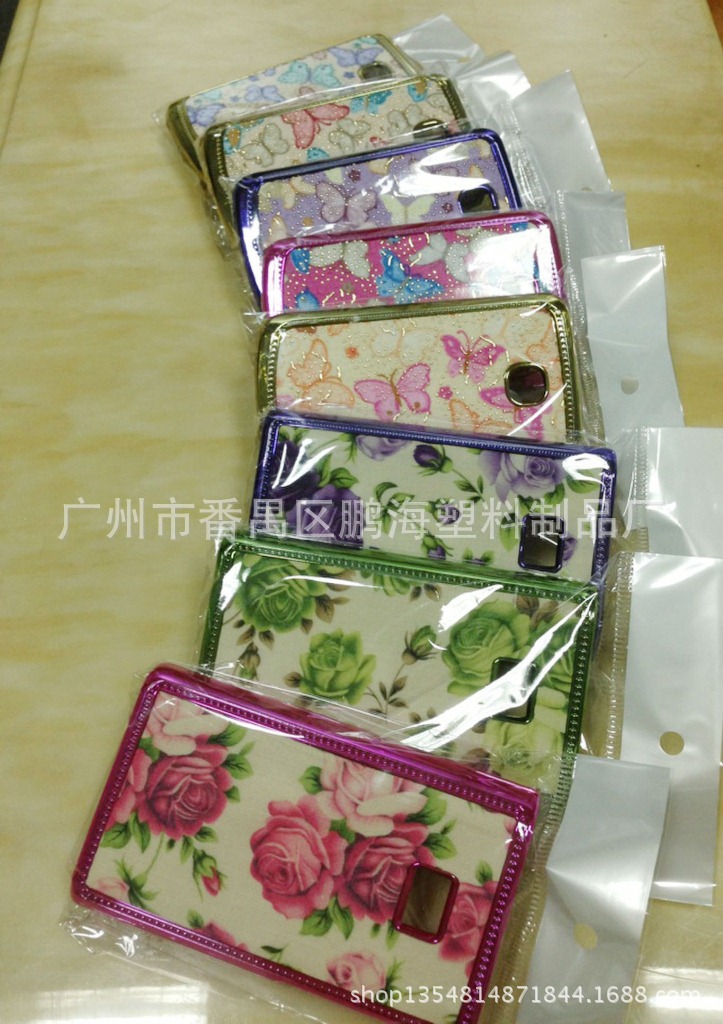 爆款彩绘布艺贴皮手机壳批发厂家