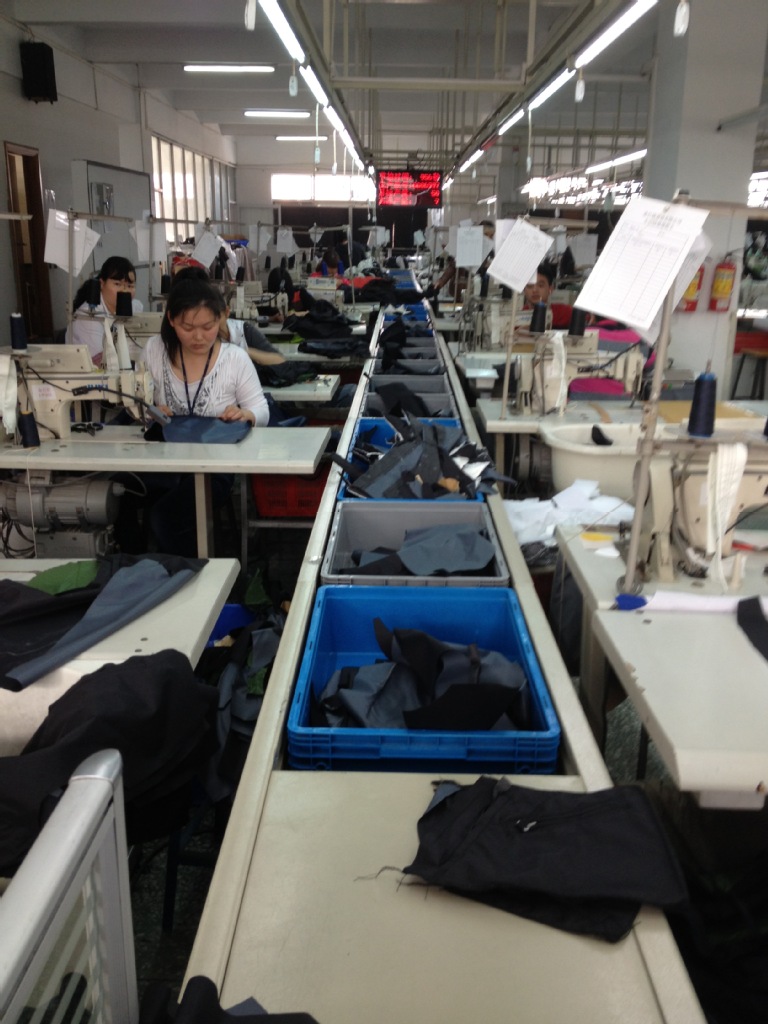 管理咨询-服装厂流水槽 气推 电动 皮带式一体