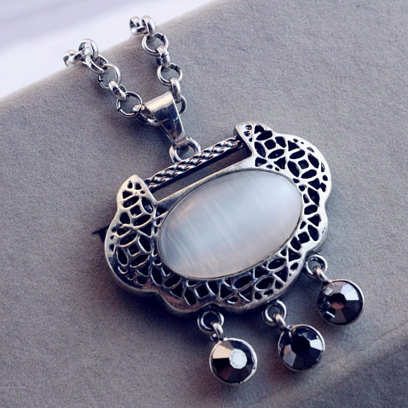 <em>批发</em> <em>韩版</em> 时尚<em>个性</em> <em>毛衣</em>链 复古 猫眼石项链 长