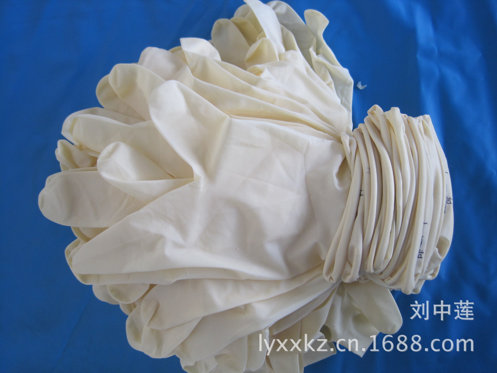 【批量供应一次性劳保手套,大卷边乳胶手套】