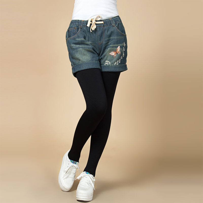 松紧低腰 可爱蝴蝶 绣花卷边<em>牛仔短裤女 图片</em>_