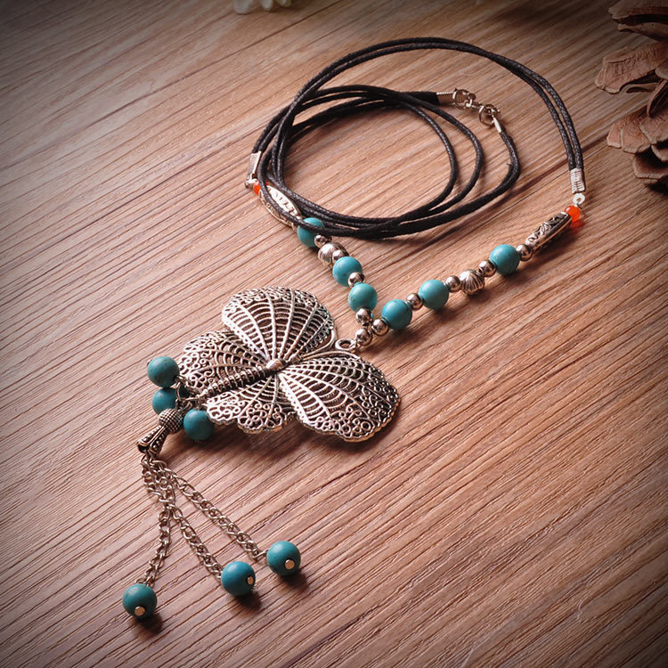 民族手工饰品 名族风艳丽 <em>松石</em>苗银蝴蝶<em>毛衣链</em>