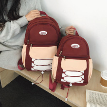 小學生書包女初中生拼色高顏值大容量輕便軟輕便少女心雙肩包背包