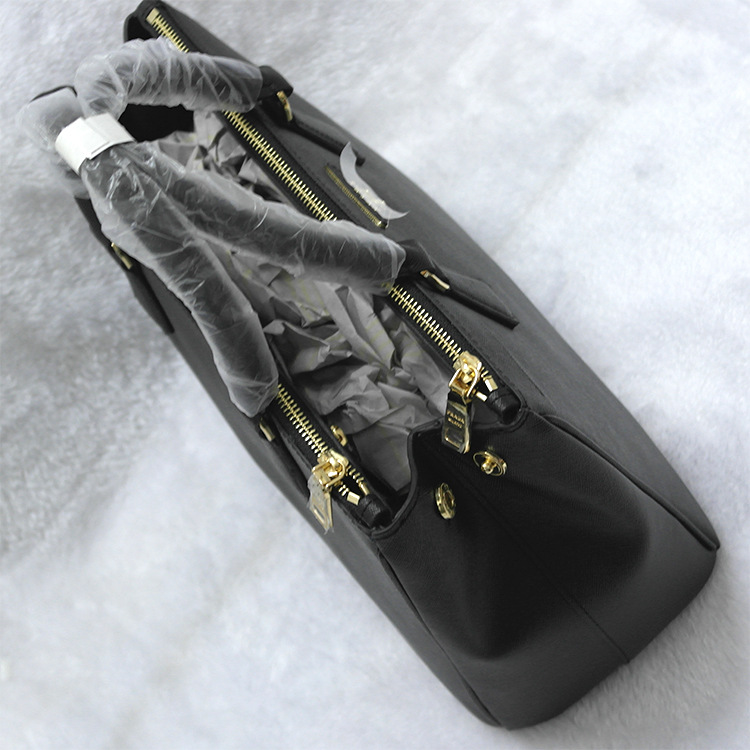 a99 批发一件代发欧美大牌p家碟中谍4莫纳十字纹杀手包 真皮女包