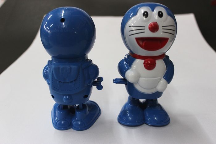 小额玩具混批发经典地摊旋转发条跳跳猫上链