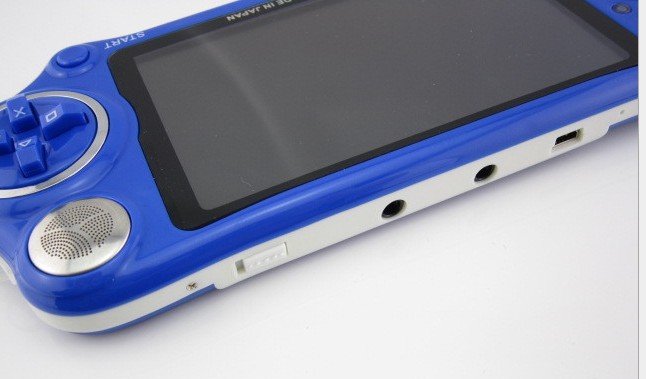 厂家直销便宜4.3寸牛角尖游戏机,自带游戏3000个支持全格式.