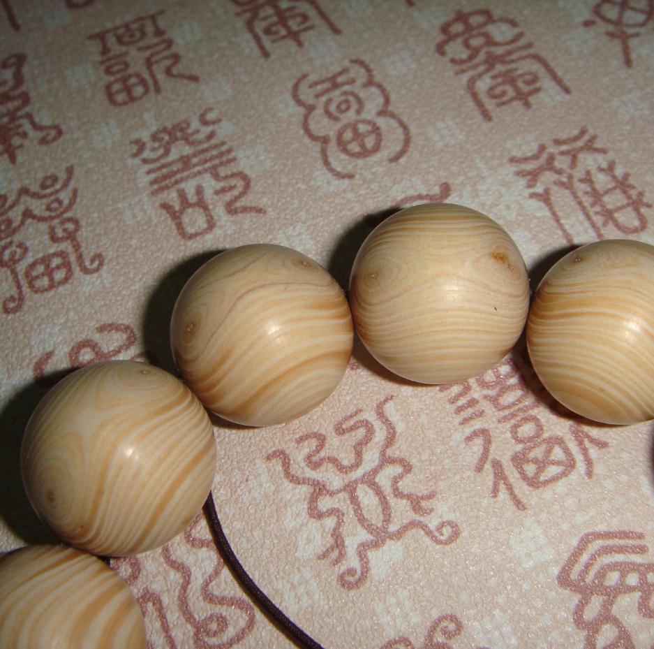 精品象牙木佛珠手串 对眼鬼脸手链批发